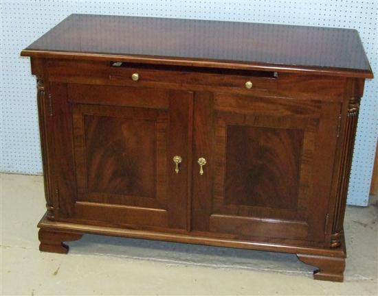 Appraisal: Twentieth century mahogany side cabinet with brushing slide above two