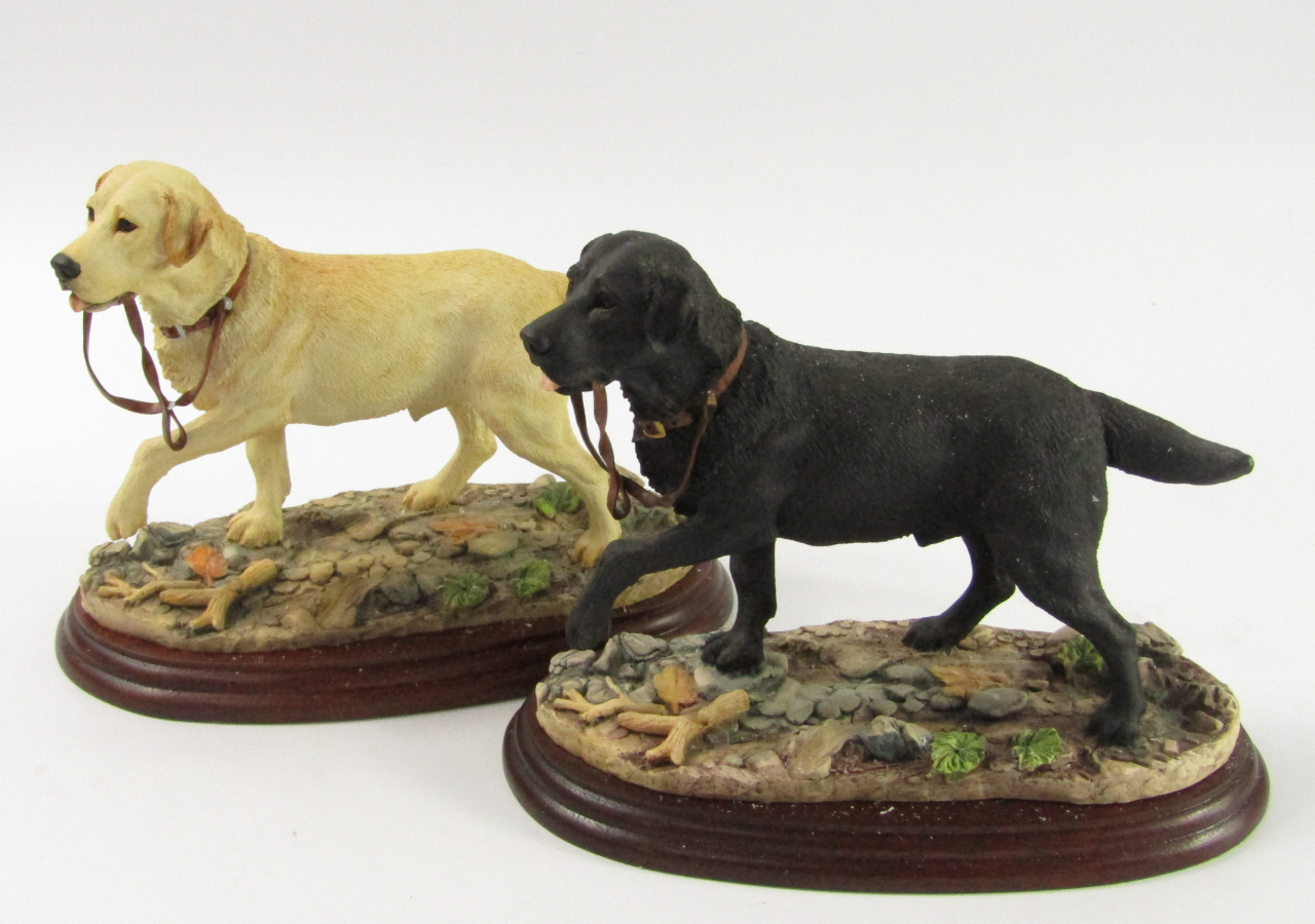 Appraisal: Two Border Fine Arts sculptures modelled as Black Labrador and