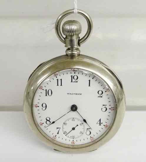 Appraisal: Early ''Waltham'' pocket watch with man on highwheel Also signed