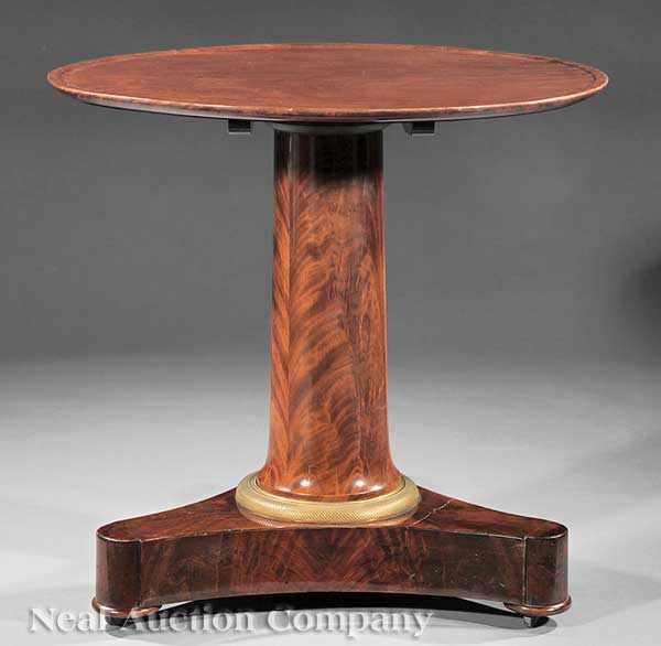 Appraisal: A French Gilt Bronze-Mounted Carved Mahogany Tilt-Top Center Table c