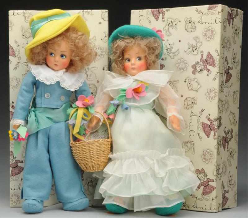 Appraisal: Lot of Anili Felt Dolls Felt boy and girl dolls