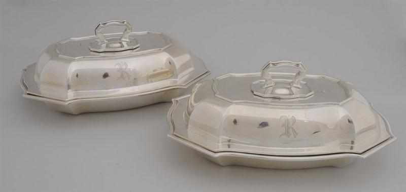 Appraisal: PAIR OF DURGIN SILVER VEGETABLE DISHES AND MONOGRAMMED COVERS Of