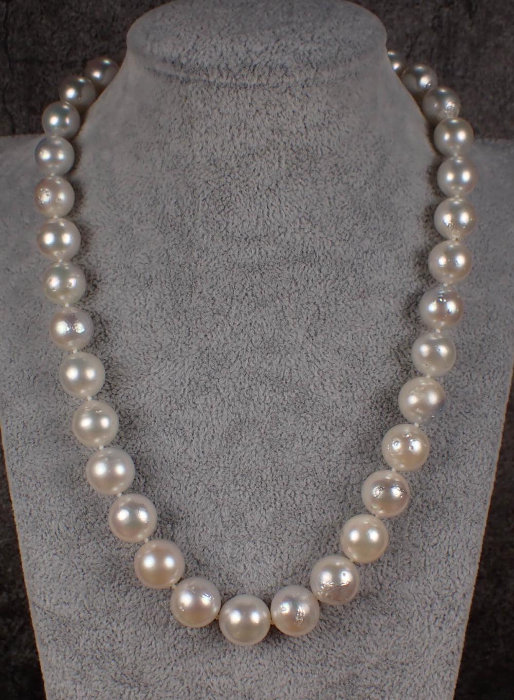 Appraisal: SOUTH SEA PEARL AND FOURTEEN KARAT GOLD NECKLACE hand-knotted strand