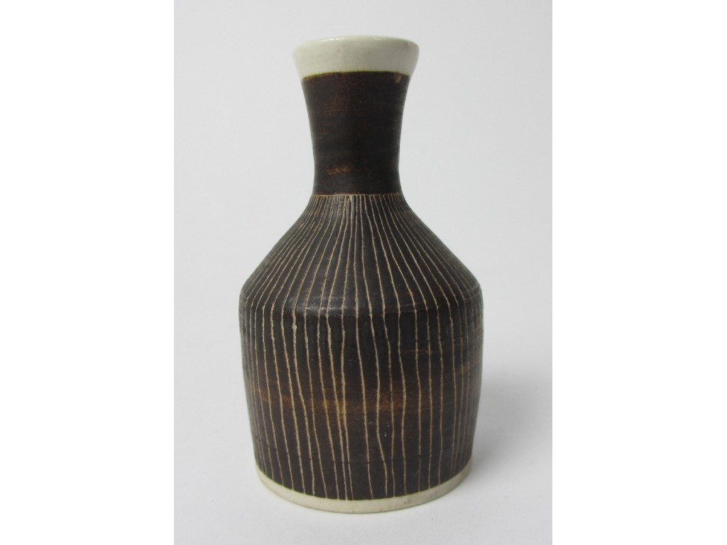 Appraisal: A Lucie Rie porcelain vase with incised vertical stripes on