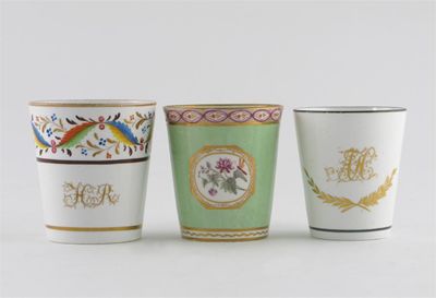 Appraisal: Three English porcelain flared beakers variously decorated with flowers and