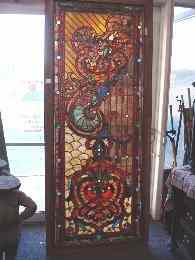 Appraisal: A Victorian Jeweled Opalescent and Stained Glass Window circa having