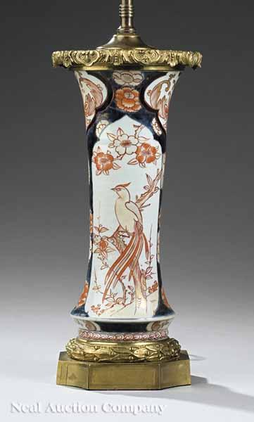 Appraisal: A Japanese Imari Porcelain Vase the cylindrical body with flared