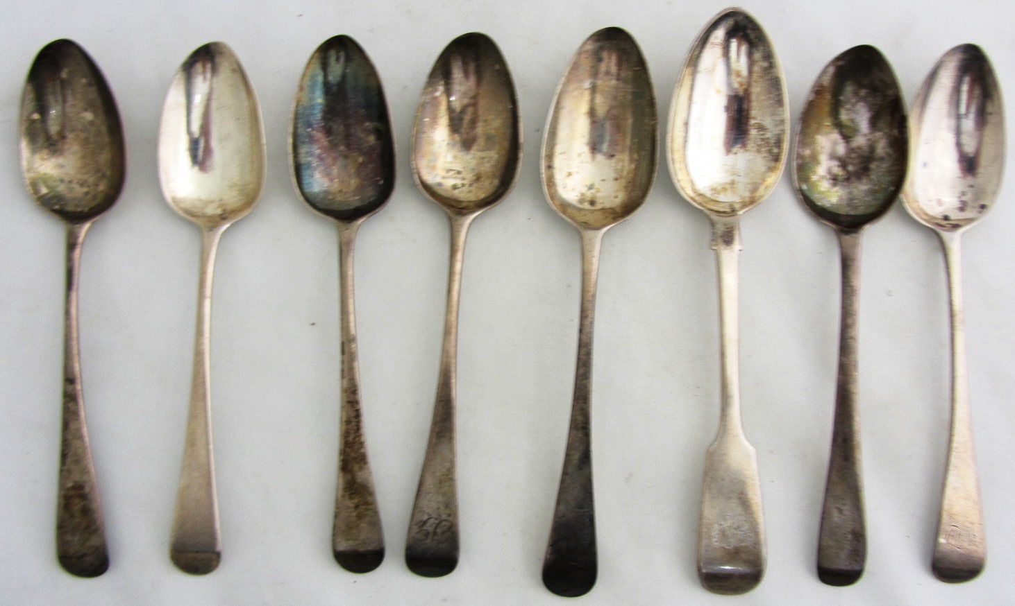 Appraisal: Two pairs of silver Old English pattern dessert spoons London