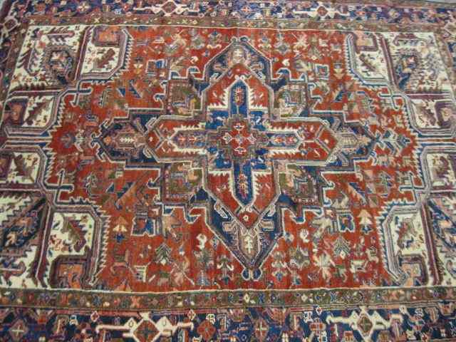 Appraisal: Heriz Persian Handmade Rug fine central medallion good coloring with