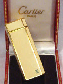 Appraisal: Cartier A Cartier lacquer and gold plated lighter in original