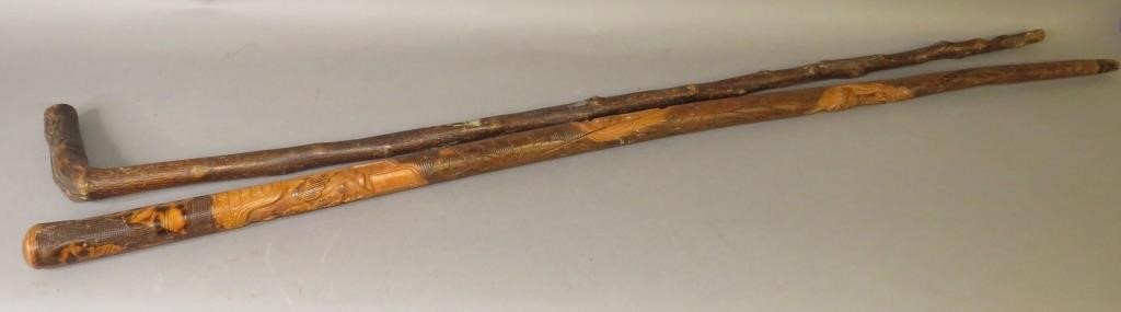 Appraisal: FOLK ART CARVED WALKING STICKSca - late th century PA