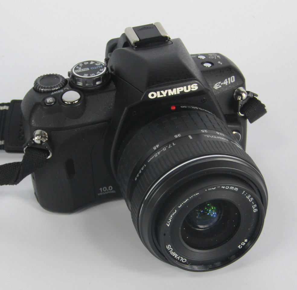 Appraisal: An Olympus E camera with a - mm - lens