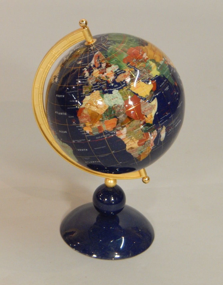 Appraisal: A modern globe inlaid in semi-precious stones on a blue