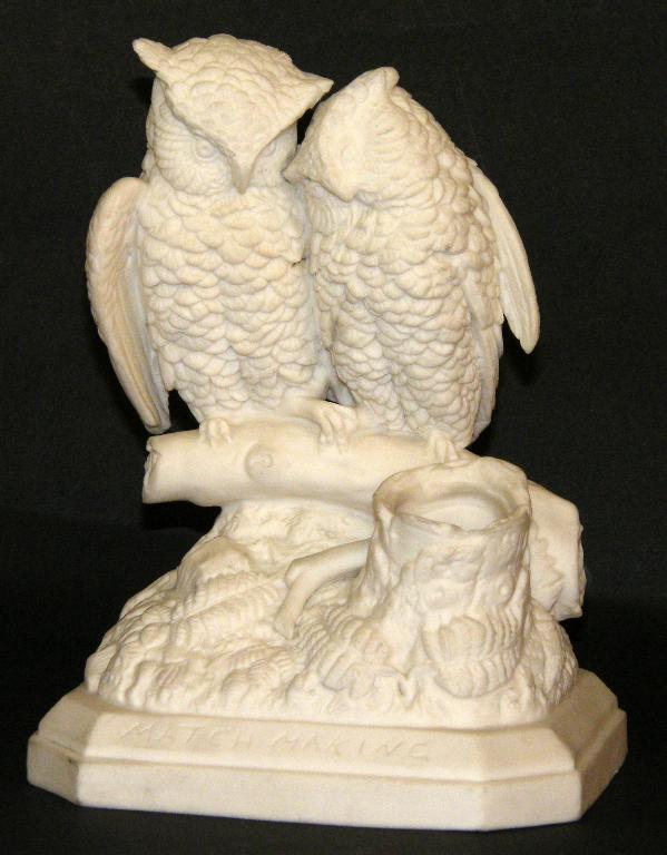 Appraisal: th century Parian match holder modelled with two owls upon