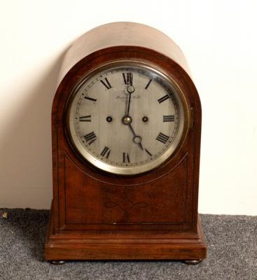 Appraisal: An arch-top mantel clock the silvered dial signed Mappin Webb