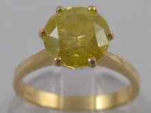 Appraisal: A yellow metal tests carat gold fancy yellow untested diamond