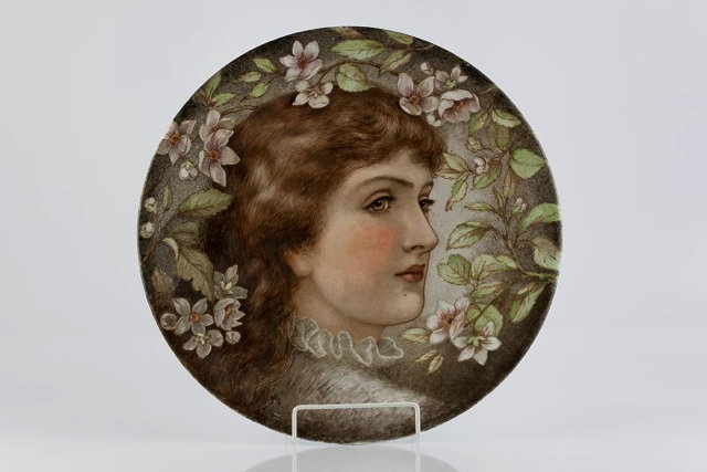 Appraisal: Pre-Raphaelite SchoolChargerprofile of a beautysigned 'N L Collins' cm diameter