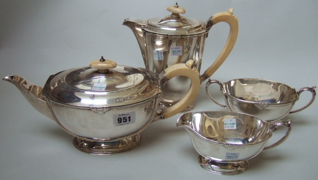 Appraisal: A silver four piece tea set comprising a teapot a