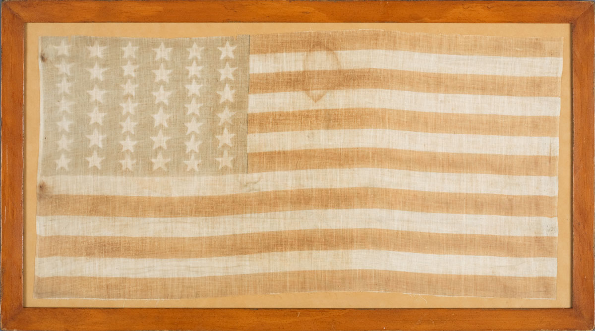 Appraisal: TWO FRAMED NINETEENTH CENTURY AMERICAN PRINTED LINEN FLAGS THIRTY-SIX AND