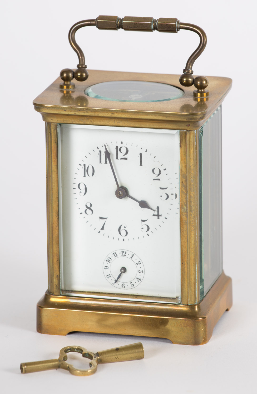 Appraisal: French brass and glass carriage clock late th century with