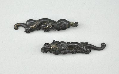 Appraisal: A Pair of Crouching Tiger Menuki Mixed metals crouching tiger