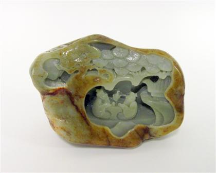 Appraisal: Chinese mottled brown and green jade boulderCarved with figures seated