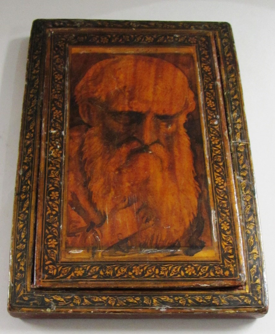 Appraisal: A Qajar lacquered papier mache mirror case with later ascription