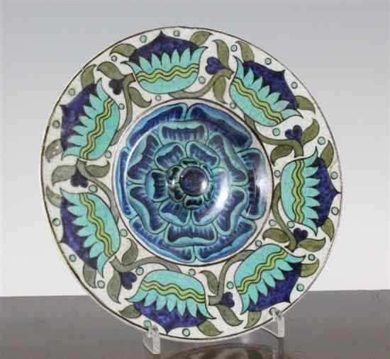 Appraisal: A Persian style pottery rosewater dish the centre with raised