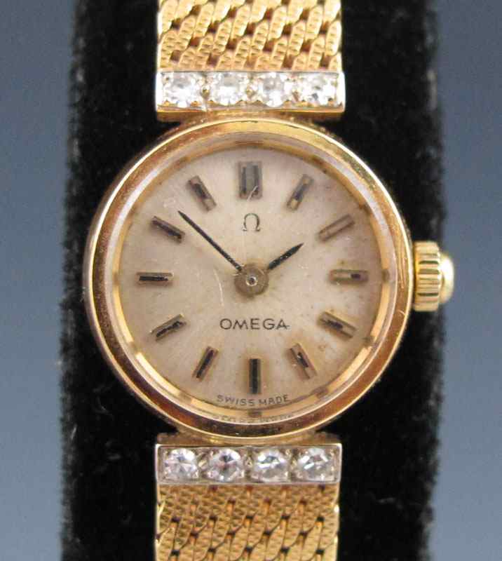 Appraisal: K DIAMOND LADIES OMEGA DRESS WATCH K yellow gold wristwatch