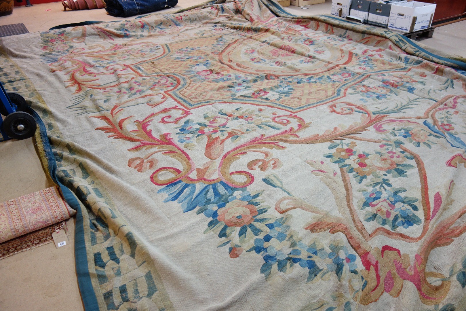 Appraisal: An Aubusson carpet the beige field with a large central