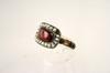 Appraisal: LADY'S RING - Antique gold garnet and pearl memorial ring