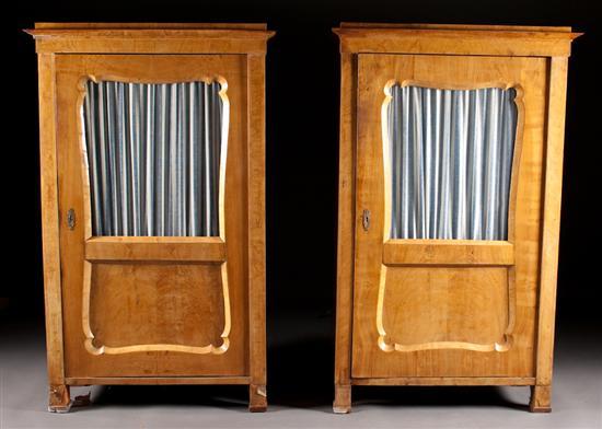 Appraisal: Pair of Biedermeier carved cherry and glass panel shranks circa