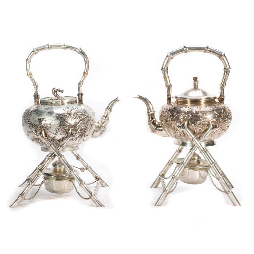 Appraisal: Late th early th Chinese silver teapots and stands Two