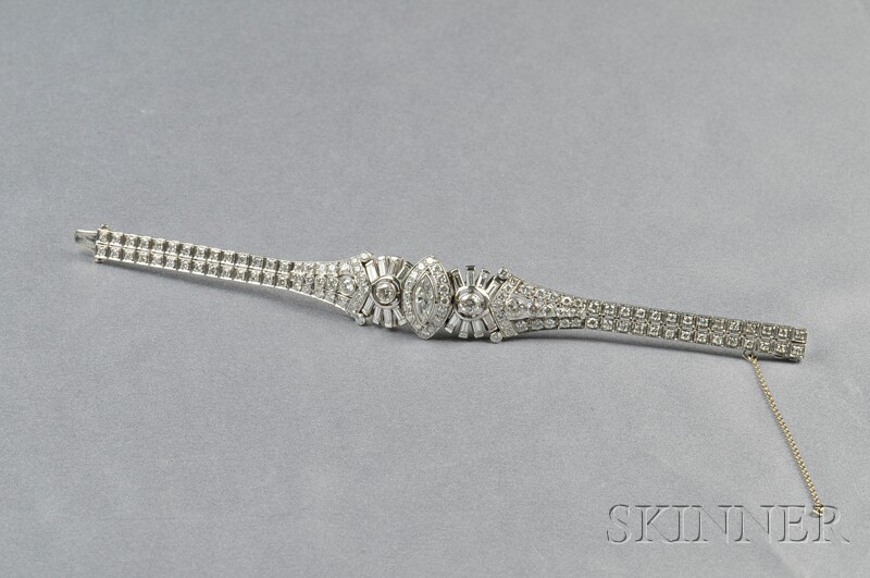 Appraisal: Platinum and Diamond Bracelet Waslikoff Sons bezel-set with a marquise-cut