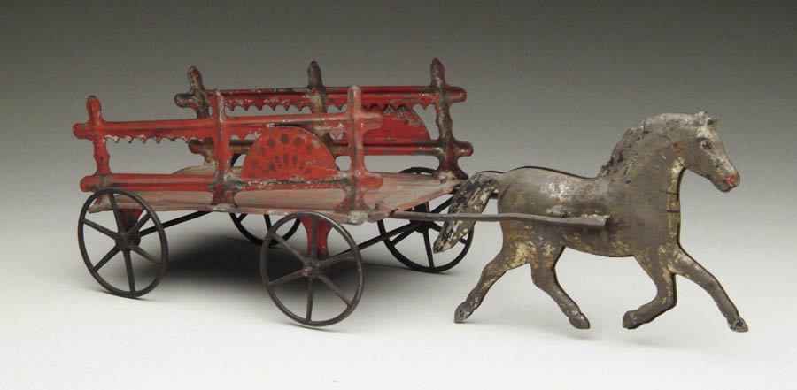 Appraisal: EARLY AMERICAN TIN DRAY WAGON A dray wagon with a