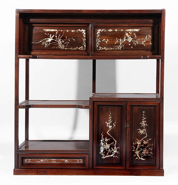 Appraisal: A Chinese rosewood and mother of pearl cabinetlate th Centuryhaving