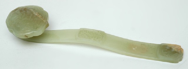 Appraisal: A CHINESE JADE RUYI SCEPTRE Possibly th century Carved with