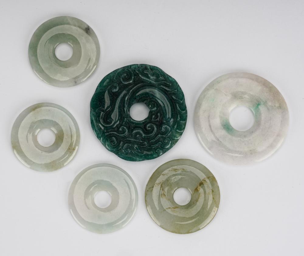 Appraisal: SIX JADE DISCScomprising five light green and off-white jade discs