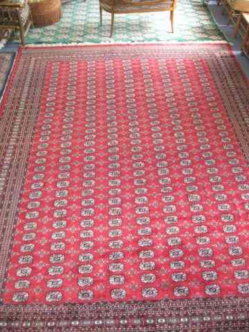 Appraisal: Bokara Handmade Room Size Rug geometric designs indigo ivory red