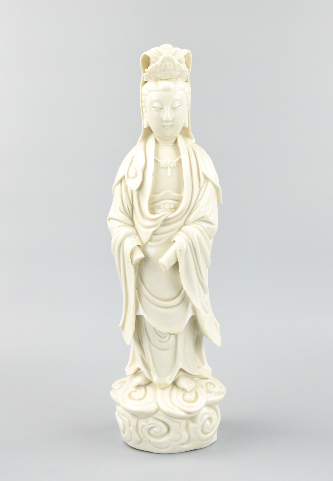 Appraisal: CHINESE DEHUA PORCELAIN FIGURE OF GUANYIN TH C A white