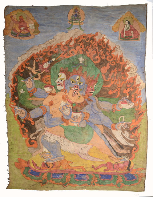 Appraisal: A TIBETAN THANKA with central god with panelled figure surround