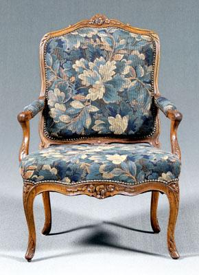 Appraisal: Louis XV carved fruitwood fauteuil foliate carved crest hand grips