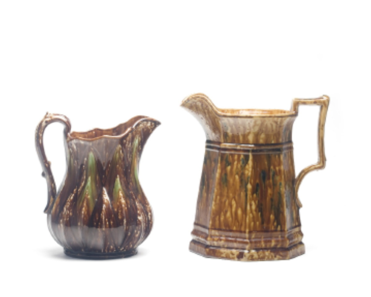 Appraisal: BENNINGTON FLINT ENAMEL PANELLED PITCHER CIRCA - Streaked in shades