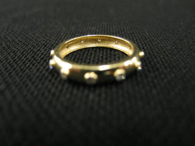 Appraisal: Diamond Band eternity style k yellow gold