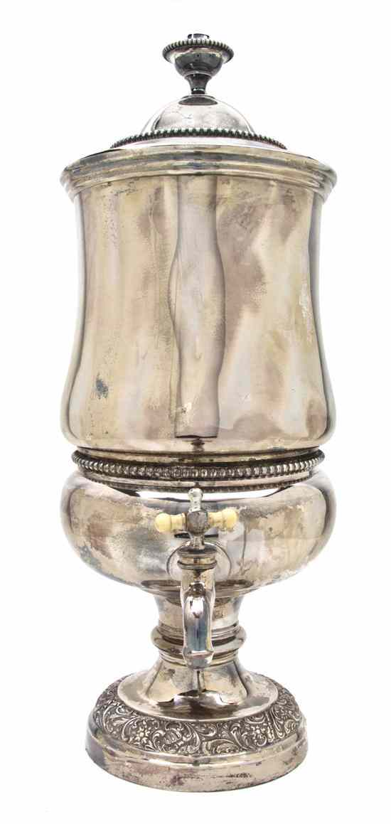 Appraisal: A Silverplate Hot Water Urn of baluster form with gadrooned