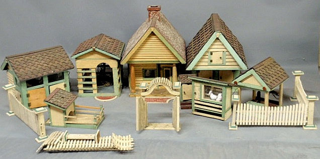 Appraisal: Miniature wood farm buildings with keystones on the eaves- eight