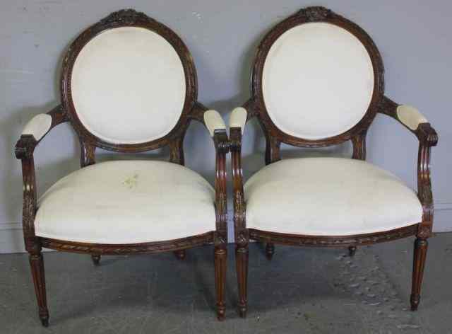 Appraisal: Pair of French Style Carved Oval Back Armchairs From a