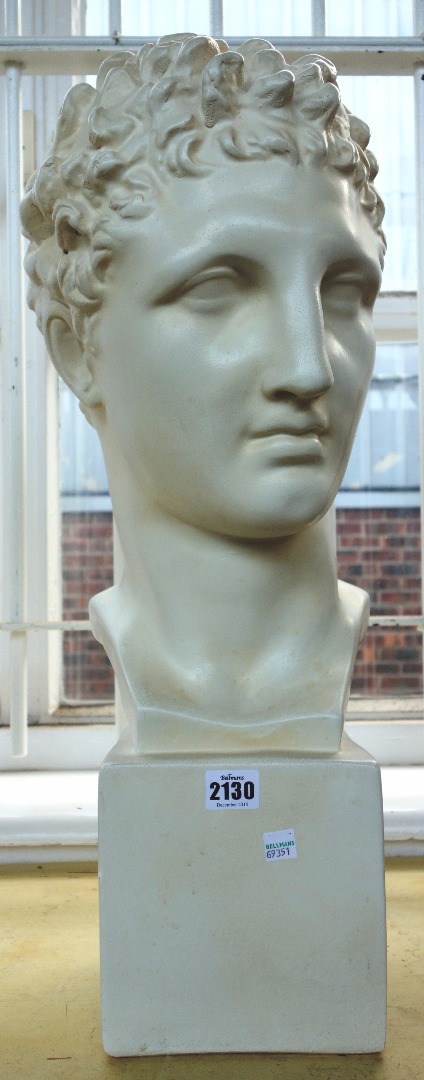 Appraisal: A modern white glaze pottery bust depicting a Romanesque male