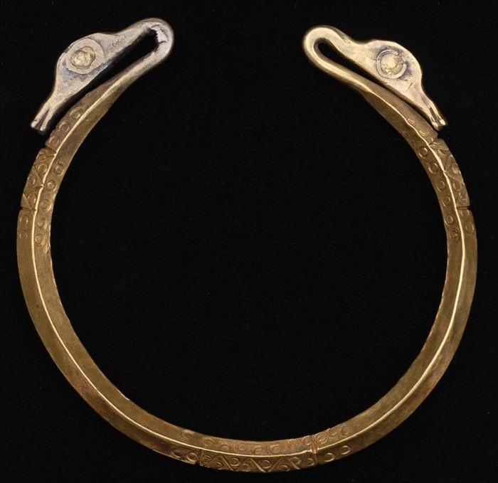 Appraisal: LURISTAN-STYLE GOLD BRACELET WITH DUCK HEAD TERMINALS Provenance Property from