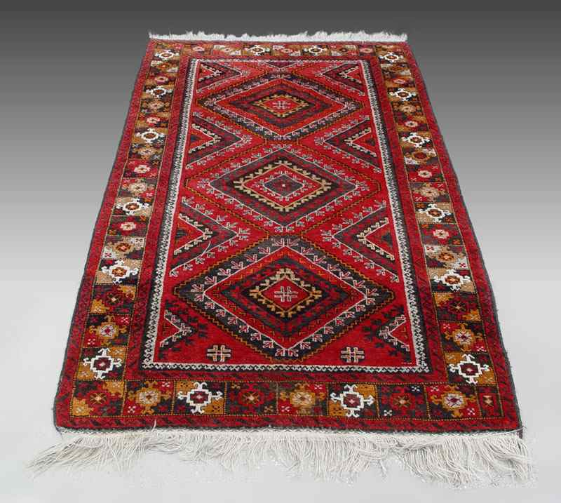 Appraisal: HAND TIED ORIENTAL RUG Alternating color paneled border with red